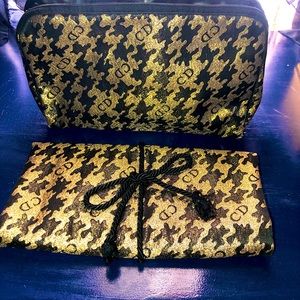 Christian Dior cosmetic bags.